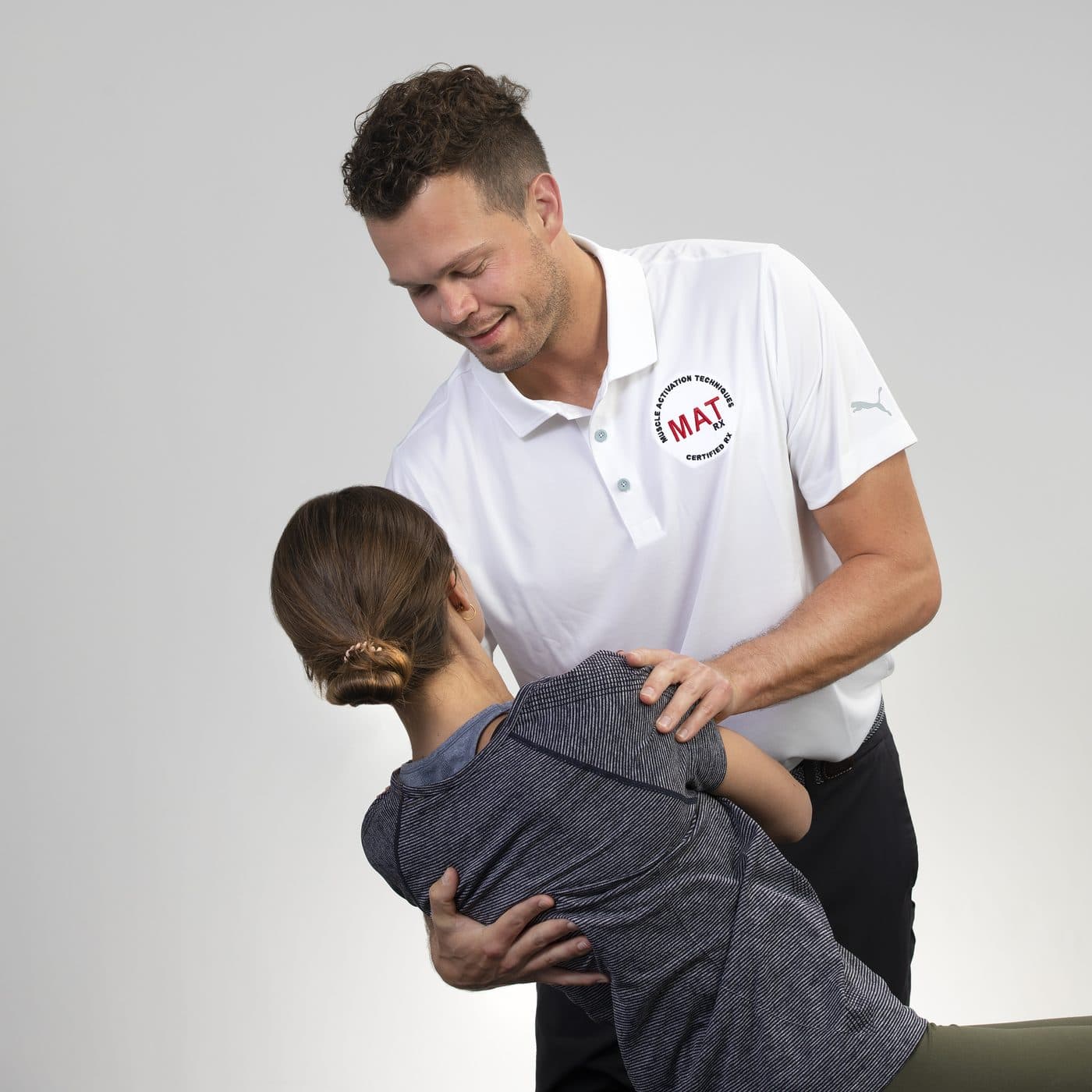 Cameron Hunt working one-on-one with a client during treatment